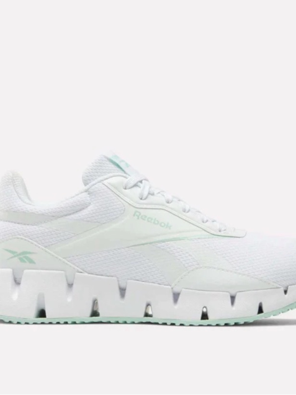 Reebok Women’s White Sneakers with Mint Accents